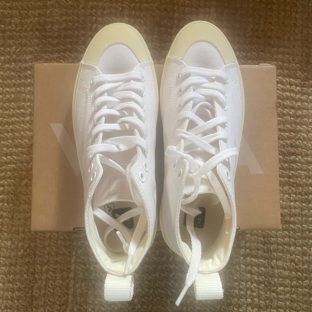 VEJA-high top lace-up sneakers in off white.